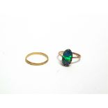 A 22 CARAT GOLD WEDDING RING 1.6g gross; and an opal doublet ring, stamped J. Pettit
