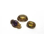 A VICTORIAN AMETHYST AND SEED PEARL BROOCH and two Victorian citrine coloured paste brooches