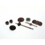 A BOHEMIAN GARNET CLUSTER BROOCH a garnet and pearl bar brooch; a bar brooch, stamped '9ct'; three