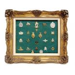 FIFTY-ONE BRITISH & IRISH CAP BADGES including those for the Royal Irish Rangers; County of London