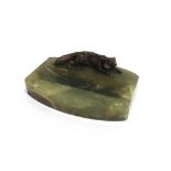 A COLD PAINTED FIGURE OF A CROUCHING FOX mounted on a shaped onyx desk tray, tray 11.5 x 7.5cm,