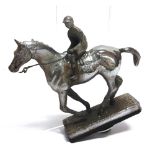 A CHROME CAR MASCOT racehorse with jockey up, on a rectangular plinth base, with screw fixing,