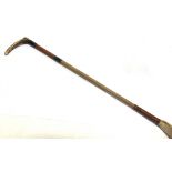 A GENT'S RIDING CROP with antler grip, twin silver collars, part leather and part plaited shaft