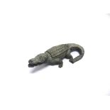 A SPELTER CROCODILE DOUBLE INKWELL with hinged lift-up back, 25cm long