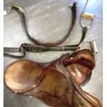 A 'STUBBEN' SADDLE 17', complete with girth, stirrup leathers and irons