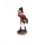 A BORDER FINE ARTS FIGURE 'Young James', No. A9799, of a standing fox in hunt dress carrying a