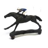 A CAR MASCOT in the form of cast metal Racehorse and Jockey, 9.5cm x 15cm long