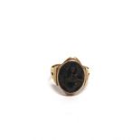 A BLOODSTONE SEAL SIGNET RING stamped '18ct', 5g gross