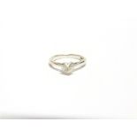 A SINGLE STONE DIAMOND 18 CARAT WHITE GOLD RING the heart cut stone stated as weighing 0.48 carats