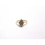 A NINE STONE DIAMOND RING unmarked, the brilliant cuts totalling approximately 0.45 carats, finger