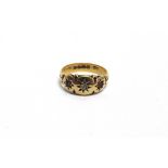 AN EDWARDIAN 18 CARAT GOLD RUBY AND DIAMOND RING Chester 1907, finger size N, 3.2g gross