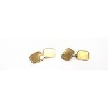 A PAIR OF 9 CARAT GOLD CUFFLINKS the cut corner rectangular panels with sunray decoration, plain