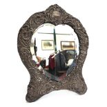 A HEART SHAPED EASEL BACK SILVER DRESSING TABLE MIRROR by William Comyns, London 1908, with