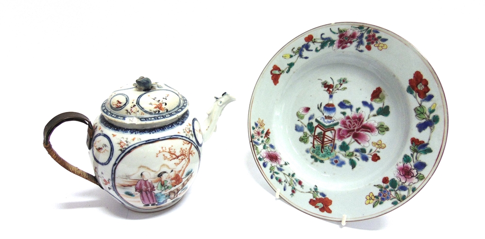 A 19TH CENTURY CHINESE PORCELAIN TEAPOT roundels decorated with a couple with child in mountainous