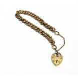 A 9 CARAT GOLD BRACELET of hollow patterned curb links, to a padlock clasp, 10g gross
