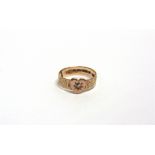 A VICTORIAN 9 CARAT GOLD DIAMOND SET RING Birmingham 1873, the heart motif star set with an old