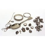 A COLLECTION OF SILVER AND SILVER COLOURED ITEMS including two silver hinged bangles; a charm