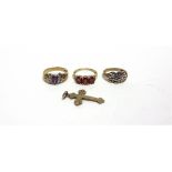 A COLLECTION OF THREE 9 CARAT GOLD STONE SET DRESS RINGS with a 9 carat gold cross pendant; 10.2g