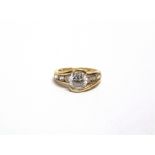 A 14 CARAT GOLD STONE SET DRESS RING finger size J, 3.4g gross