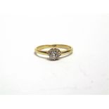 A SINGLE STONE DIAMOND RING stamped '18c', the old brilliant cut of approximately 0.5 carats, finger