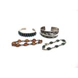 A TURQUOISE SET TORQUE BANGLE an unmarked bangle; a silver jade set bracelet; and another stone