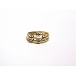 AN 18 CARAT GOLD TWO COLOUR RING finger size P, 2.5g gross