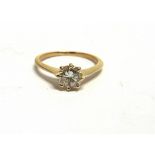 A DIAMOND SINGLE STONE RING the yellow mount unmarked, the brilliant cut measuring approximately 6.