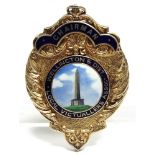 A SILVER GILT AND ENAMEL CHAIRMAN OF WELLINGTON AND DISTRICT LOCAL VICTUALLERS ASSOCIATION BADGE