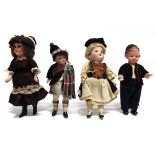 FOUR SMALL DOLLS three with bisque heads and the fourth with a moulded plastic head, each with