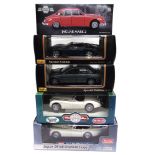 FIVE 1/18 SCALE DIECAST MODEL CARS all Jaguars, each mint or near mint and boxed.