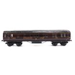 [O GAUGE]. AN EXLEY L.M.S. COMPOSITE SLEEPING CAR, 713 lined maroon livery, unboxed.