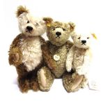 THREE STEIFF COLLECTOR'S TEDDY BEARS the largest 40cm high, all unboxed.