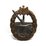 A GERMAN THIRD REICH COASTAL DEFENCE WAR BADGE by Schwerin of Berlin, gilt washed, maker's name to
