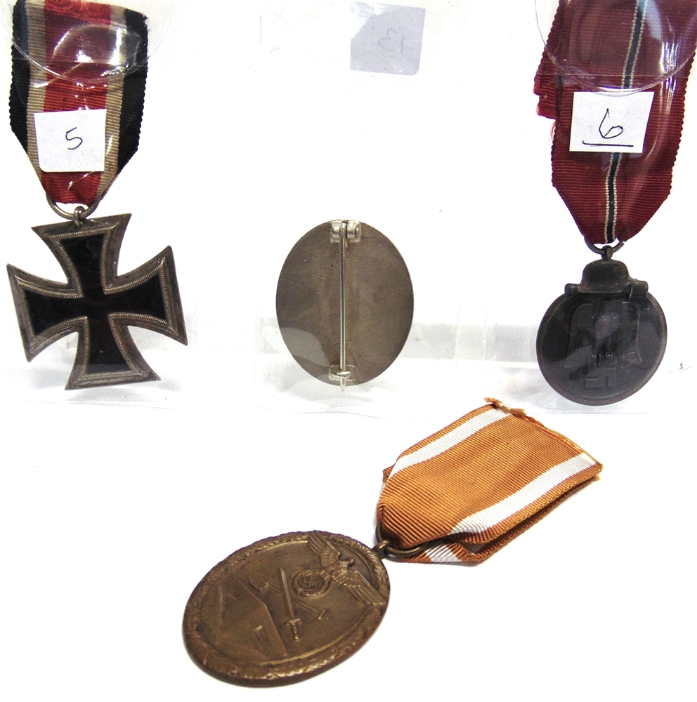 A SECOND WORLD WAR GERMAN THIRD REICH GROUP OF FOUR MEDALS comprising the Iron Cross Second Class; - Image 2 of 2