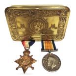 A GREAT WAR PRINCESS MARY CHRISTMAS 1914 BRASS GIFT TIN with a Great War pair of medals to Driver W.