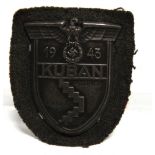 A GERMAN THIRD REICH KUBAN CAMPAIGN SHIELD on its cloth backing.