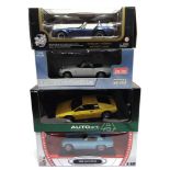 FOUR 1/18 SCALE DIECAST MODEL CARS comprising an Auto Art No.75301, 1979 Lotus Esprit, yellow;