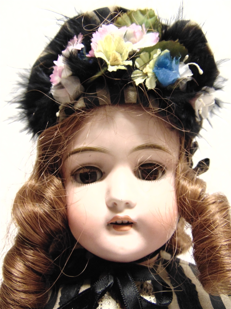 A HAMBURGER & CO. BISQUE SOCKET HEAD DOLL with a replacement auburn ringlet wig, sleeping brown - Image 2 of 2