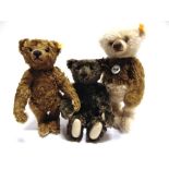 THREE STEIFF COLLECTOR'S TEDDY BEARS the largest 34cm high, all unboxed.