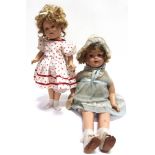 TWO SHIRLEY TEMPLE COMPOSITION DOLLS the largest with original Adrena Doll Co. 'Fifth Avenue