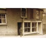 POSTCARDS - SOMERSET Eighty-one cards, including real photographic views of a shopfront, R.