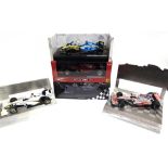 SEVEN 1/18 SCALE DIECAST MODEL FORMULA 1 RACING CARS together with a 1/18 scale Le Mans racing