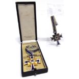 A GERMAN THIRD REICH MOTHER'S CROSS IN GOLD by Franz Reischauer Oberstein, cased; together with a