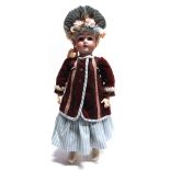 AN ALT BECK & GOTTSCHALCK BISQUE SOCKET HEAD DOLL lacking wig, with sleeping brown glass eyes and an