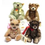 FOUR STEIFF COLLECTOR'S TEDDY BEARS the largest 17cm high, all unboxed.