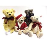 FOUR STEIFF COLLECTOR'S TEDDY BEARS the largest 27cm high, all unboxed.