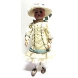 A SOCIETE FRANCAISE DE FABRICATION DE BEBES & JOUETS BISQUE SOCKET HEAD DOLL lacking wig, with