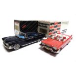 [WHITE METAL]. TWO 1/43 SCALE WESTERN MODELS CARS comprising a No.WMS51X, 1958 Plymouth Belvedere (