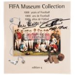 FIFA Museum Collection book signed by the England 1966 World Cup Final goalscorers Geoff Hurst &