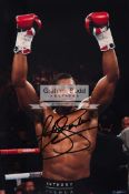 Anthony Joshua signed photograph, 12 by 8in.